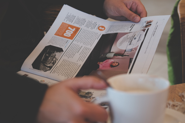 someone reading newspaper